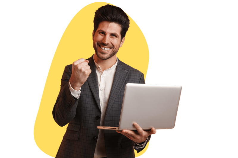 businessman excited with laptop